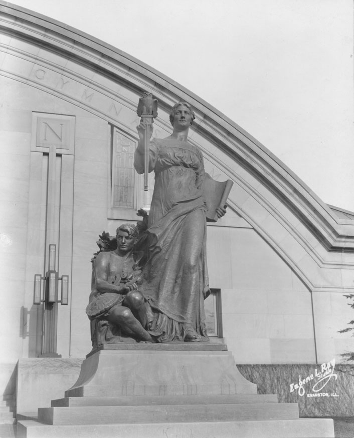 Patten Gym, Statues: "Pat" (female), representing self-sacrifice